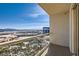 Balcony with city views overlooking a beautiful pool and well-landscaped grounds at 145 E Harmon Ave # 2008, Las Vegas, NV 89109