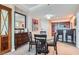 Open concept dining area adjacent to a modern kitchen with barstool seating at 145 E Harmon Ave # 2008, Las Vegas, NV 89109