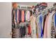 Large walk-in closet with clothing and shoe racks for optimal organization and storage at 1509 Linnbaker Ln # 203, Las Vegas, NV 89110