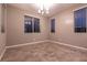 Dining room features neutral walls, tile flooring, and natural light at 1544 Karst Pond Ave, North Las Vegas, NV 89084