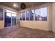 Enclosed patio with brick flooring and abundant natural light at 1544 Karst Pond Ave, North Las Vegas, NV 89084