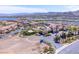 Beautiful aerial view of a luxury community, showcasing nearby lake and mountain views at 21 Via Visione # 201, Henderson, NV 89011