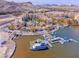 Resort-style community with lake access, boat docks, and lush landscaping at 21 Via Visione # 201, Henderson, NV 89011