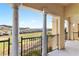Balcony view from this property overlooking a golf course and mountain range at 21 Via Visione # 201, Henderson, NV 89011