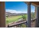 A view of the golf course from the house with a metal railing at 21 Via Visione # 201, Henderson, NV 89011