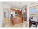 Spacious kitchen features stainless steel appliances and ample counter space at 21 Via Visione # 201, Henderson, NV 89011