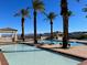 Resort-style pool features surrounding landscaping, seating, and mountain views at 21 Via Visione # 201, Henderson, NV 89011