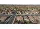 Aerial view of a residential neighborhood showcasing well-maintained homes with mature landscaping at 2125 Desert Woods Dr, Henderson, NV 89012