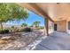 Covered patio extends into a low-maintenance backyard with gravel at 2253 Laurel Heights Ln, Henderson, NV 89052