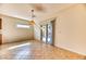 Bright dining area features tile flooring, sliding glass door and decorative light fixture at 2253 Laurel Heights Ln, Henderson, NV 89052