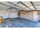 Spacious garage with ample storage cabinets and shelving to maximize organization at 2253 Laurel Heights Ln, Henderson, NV 89052