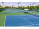 Well-maintained blue and green tennis courts within the community at 2253 Laurel Heights Ln, Henderson, NV 89052