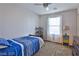 This bedroom features neutral walls, carpeted floors, and a single window for soft natural light at 2832 Aragon Terrace Way, Henderson, NV 89044