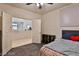 Cozy bedroom with stylish carpet and ensuite bath at 2832 Aragon Terrace Way, Henderson, NV 89044