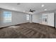 Large bedroom featuring carpet, a ceiling fan, and an open doorway to the rest of the home at 2832 Aragon Terrace Way, Henderson, NV 89044