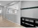 Open hallway leading to living area, highlighted by stylish shelves and wall accents at 2832 Aragon Terrace Way, Henderson, NV 89044