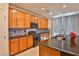 Well-equipped kitchen with stainless steel appliances, granite countertops, and tile backsplash at 2832 Aragon Terrace Way, Henderson, NV 89044