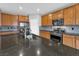 Kitchen with granite countertops, stainless steel appliances, and decorative backsplash at 2832 Aragon Terrace Way, Henderson, NV 89044