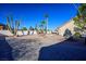 Expansive backyard featuring desert landscaping and palm trees at 3112 Hayden Ct, Las Vegas, NV 89134