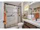 Elegant bathroom with a glass enclosed shower and dark wood finish vanity at 3112 Hayden Ct, Las Vegas, NV 89134