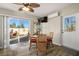 Cozy dining area with sliding glass doors leading to the patio, creating a seamless indoor-outdoor flow at 3112 Hayden Ct, Las Vegas, NV 89134