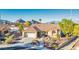 Aerial view of a beautiful home with desert landscaping and a two-car garage at 3112 Hayden Ct, Las Vegas, NV 89134