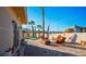 Charming outdoor patio area with comfortable seating and desert landscaping at 3112 Hayden Ct, Las Vegas, NV 89134