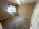 Carpeted bedroom features window coverings and a ceiling fan at 3208 Paragon Pointe St, Las Vegas, NV 89129