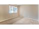 Neutral bedroom showcasing a window bringing in natural light and carpet flooring at 3208 Paragon Pointe St, Las Vegas, NV 89129