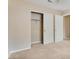 Bedroom closet featuring double doors, hanging bar, and neutral carpet at 3208 Paragon Pointe St, Las Vegas, NV 89129