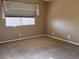 View of carpeted bedroom with neutral walls, window, and ample space at 3208 Paragon Pointe St, Las Vegas, NV 89129