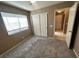 The bedroom has a window and a closet with sliding doors at 3208 Paragon Pointe St, Las Vegas, NV 89129