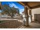 View from the front porch, showcasing decorative columns and desert landscaping at 3208 Paragon Pointe St, Las Vegas, NV 89129