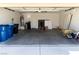 This garage is spacious and features storage areas and an entry door at 3208 Paragon Pointe St, Las Vegas, NV 89129