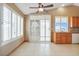 Eat-in kitchen area with tile flooring, stainless sink, and plenty of windows at 3208 Paragon Pointe St, Las Vegas, NV 89129