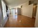 Spacious living room features wood floors, plantation shutters, fireplace, and neutral paint throughout at 3208 Paragon Pointe St, Las Vegas, NV 89129