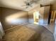 Main bedroom with ceiling fan, and view to the ensuite bath at 3208 Paragon Pointe St, Las Vegas, NV 89129