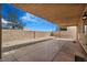 A covered patio boasts a concrete floor, providing a versatile outdoor space for leisure and entertainment at 3208 Paragon Pointe St, Las Vegas, NV 89129