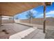 A covered patio features a concrete floor and ample space for outdoor furniture, perfect for entertaining or relaxing at 3208 Paragon Pointe St, Las Vegas, NV 89129