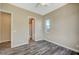 Bedroom featuring wood-look floors, and a view of the attached bath at 3356 Dalmore St, Henderson, NV 89044