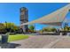 Gathering space with a central tower and shade sail over a brick walkway at 3356 Dalmore St, Henderson, NV 89044