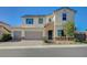 Charming two-story home featuring a three-car garage and desert landscaping at 3356 Dalmore St, Henderson, NV 89044