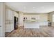 Bright kitchen with white cabinets and stainless appliances at 3356 Dalmore St, Henderson, NV 89044