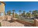 Charming brick patio with outdoor seating overlooking a peaceful residential street at 3558 Harbor Tides St, Las Vegas, NV 89147