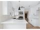 Beautiful kitchen with stainless appliances, quartz counters, and white subway tile backsplash at 3853 Kellogg Ave, Las Vegas, NV 89115