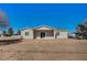 Backyard of home with a covered patio and plenty of space for relaxing at 395 W Cox Ave, Overton, NV 89040