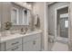 Well-lit bathroom featuring a vanity with a white countertop and undermount sink at 395 W Cox Ave, Overton, NV 89040