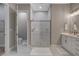 Contemporary bathroom with a glass-enclosed shower and modern fixtures at 395 W Cox Ave, Overton, NV 89040