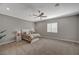 Cozy bedroom with carpet, a ceiling fan, and a window at 395 W Cox Ave, Overton, NV 89040