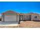 Charming single story home with a two car garage and desert landscaping at 395 W Cox Ave, Overton, NV 89040